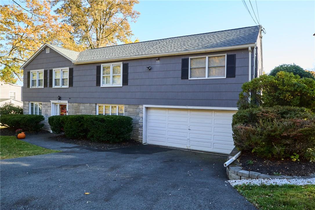 View of front of property with a garage