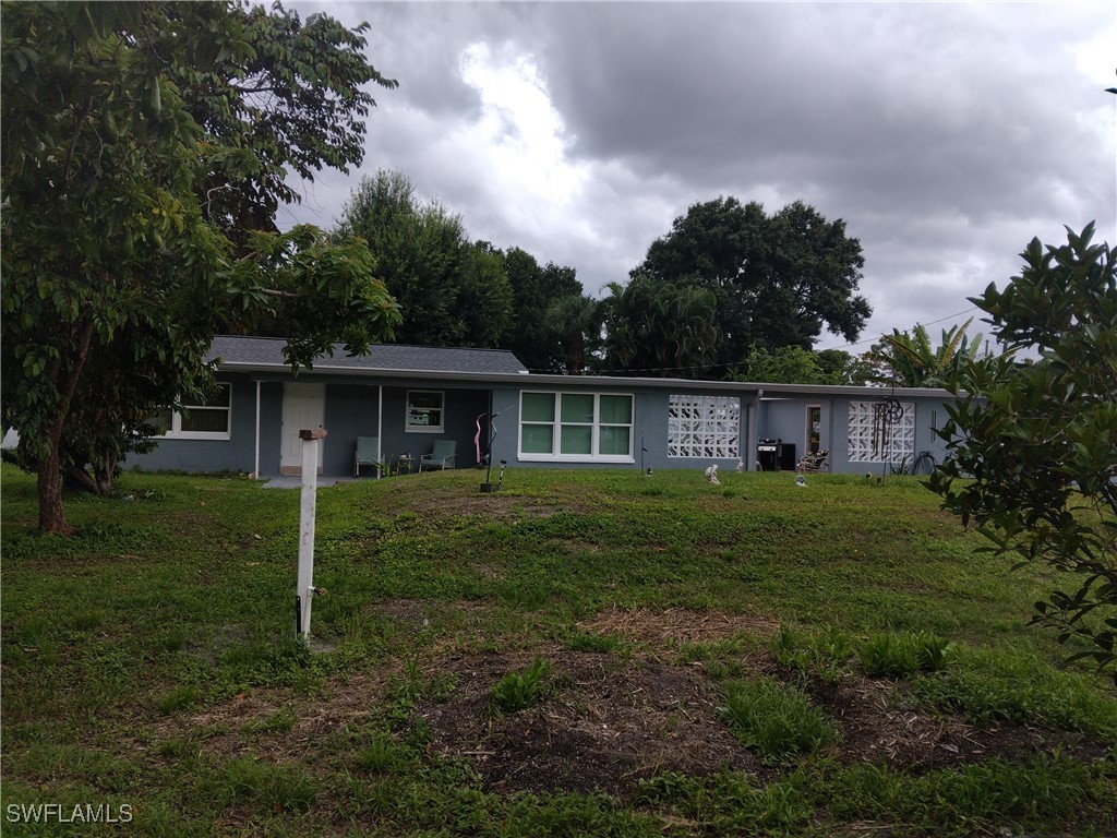 a view of house with outdoor space