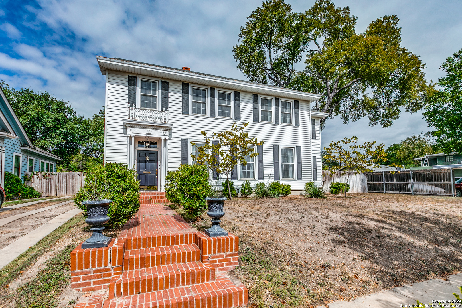 a view of a house with a porch