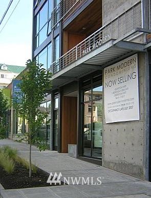 a view of a building on a street