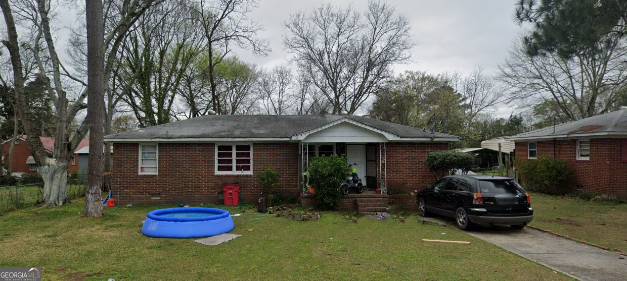 a car parked in front of a house