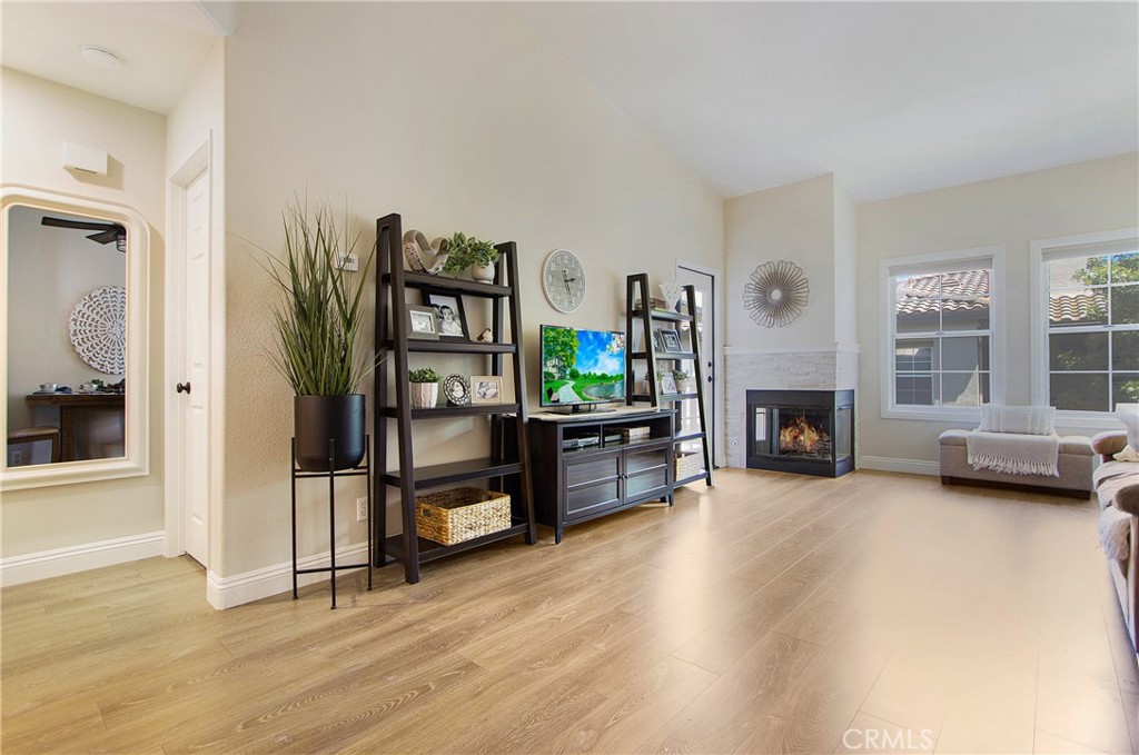 a view of a livingroom with furniture and a fireplace