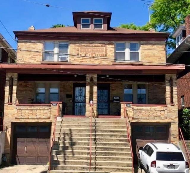 a front view of a house with a balcony