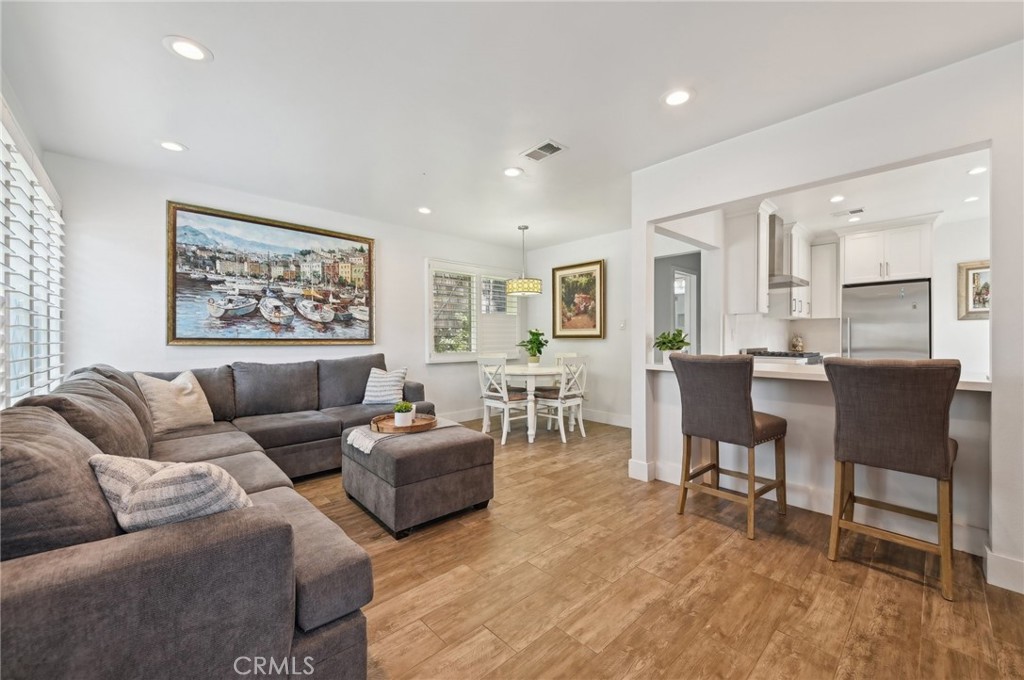 a living room with furniture and a table