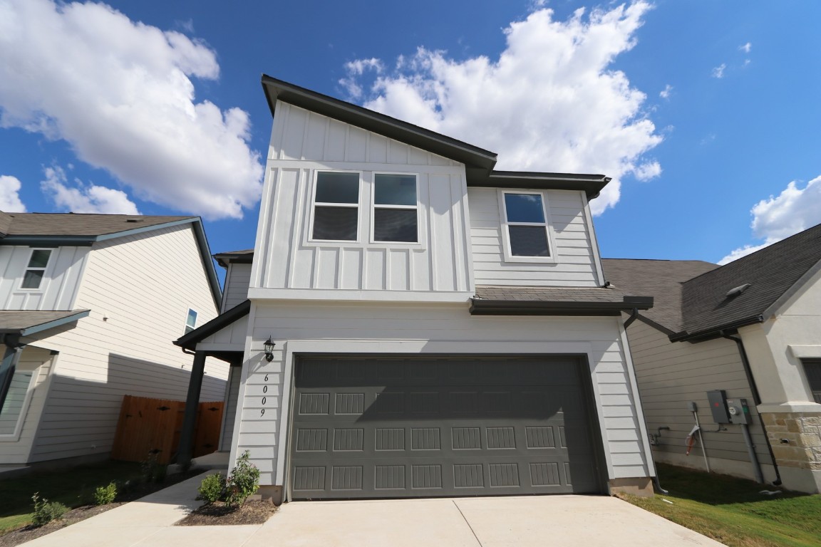 a front view of a house with balcony