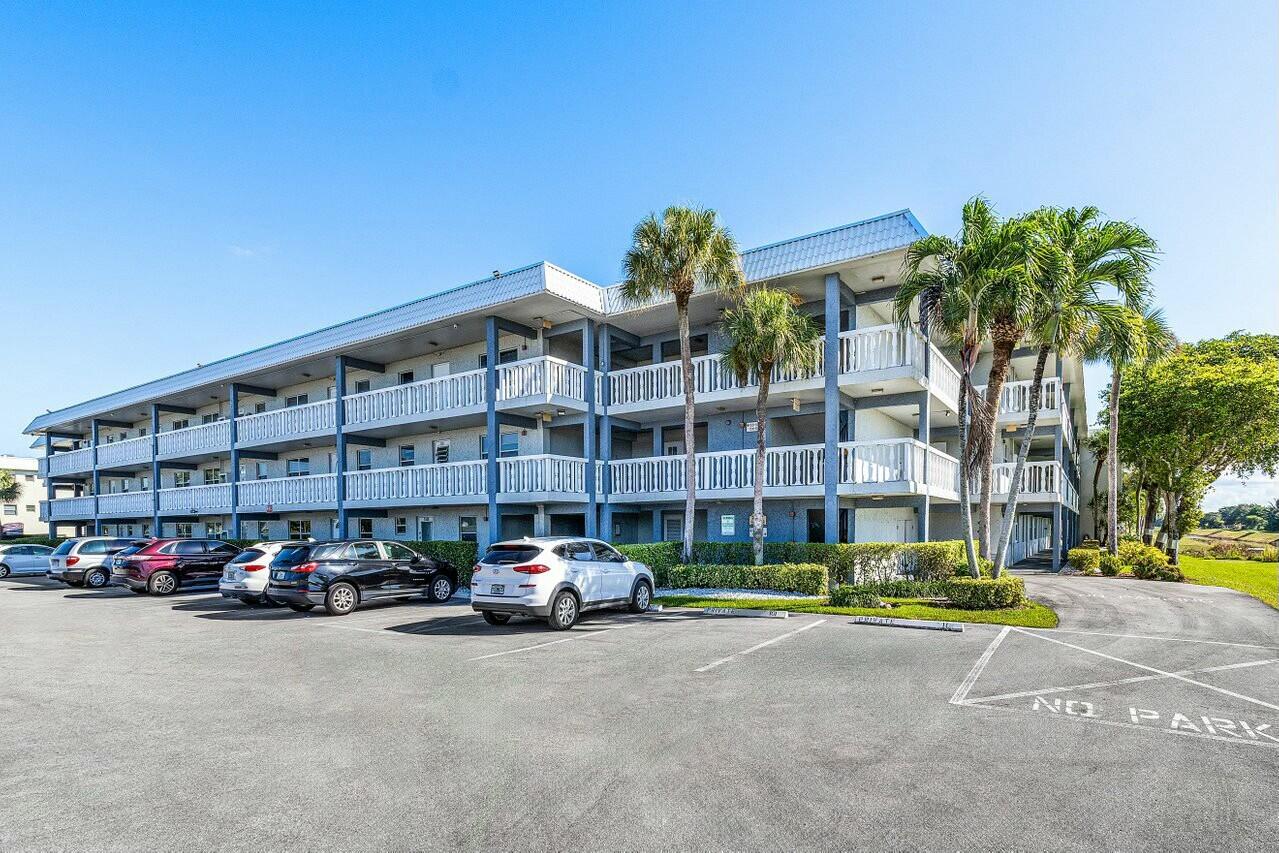 a building with cars parked in front of it