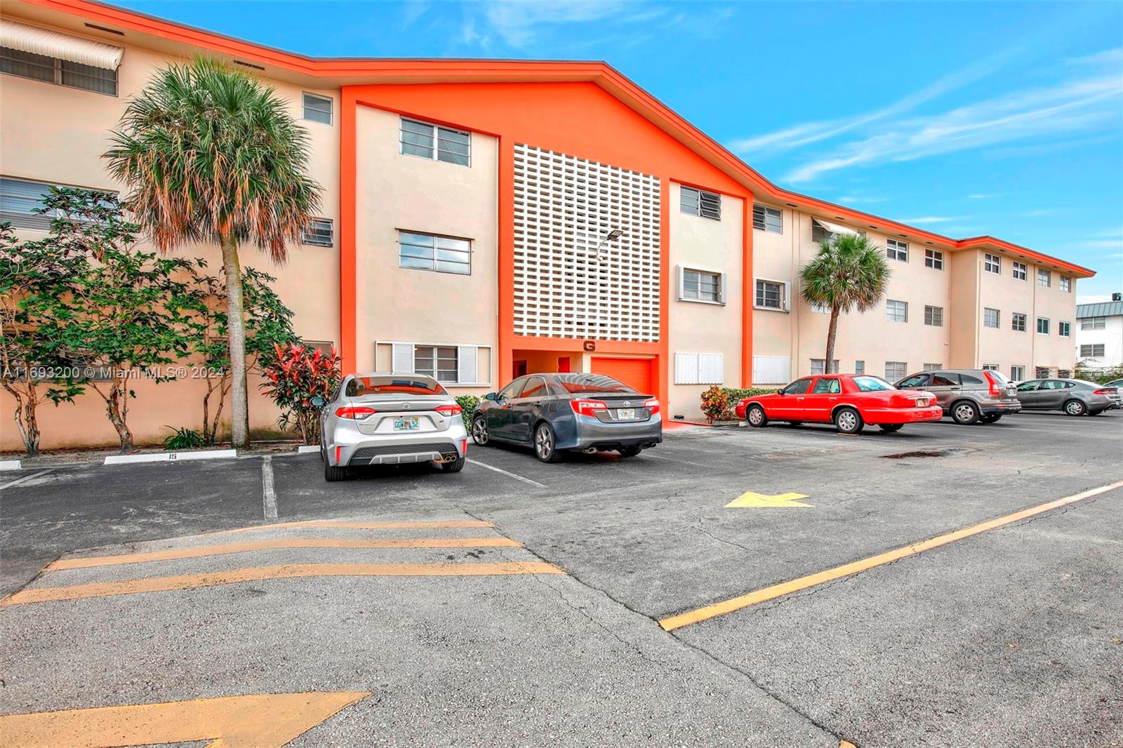 a cars parked in front of a building