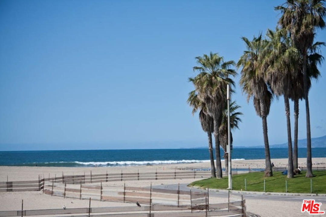 a view of an ocean and a building