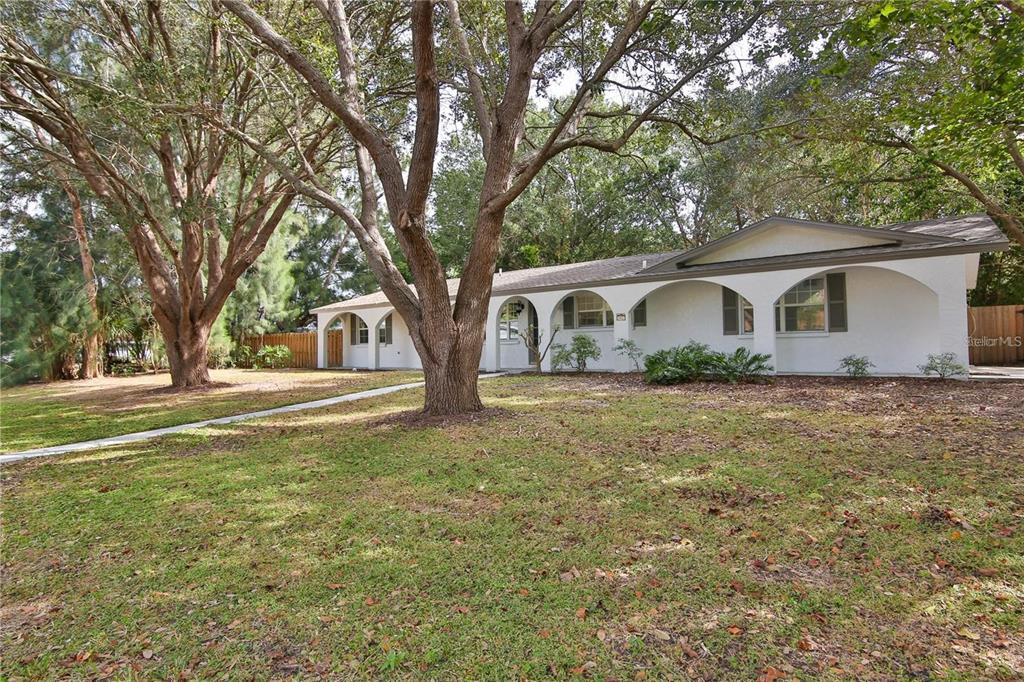 a house with trees in front of it