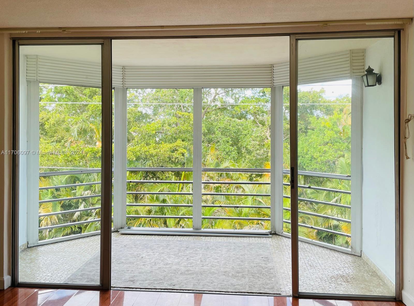 a view of a room that has a window