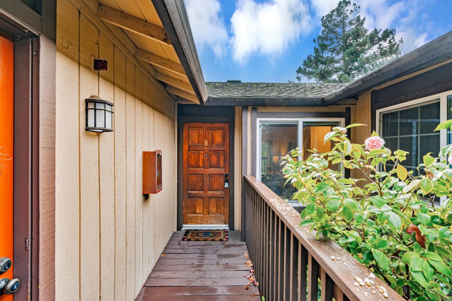 a view of a porch with wooden floor