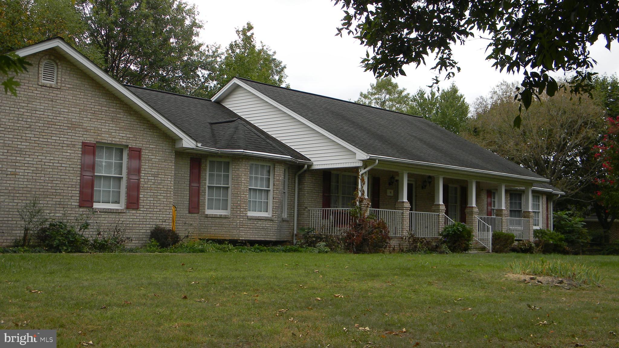 a view of a house with garden