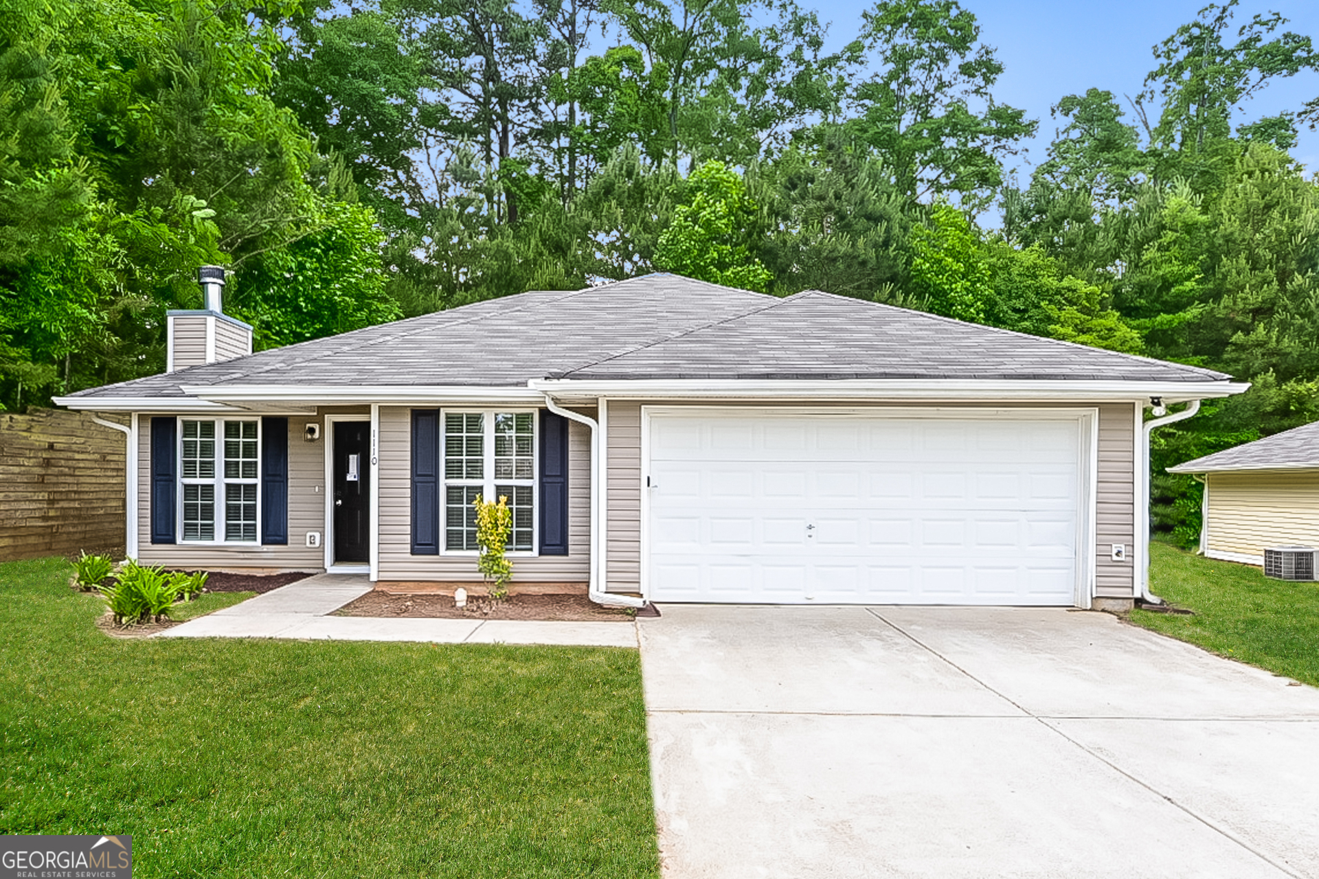 front view of house with a yard