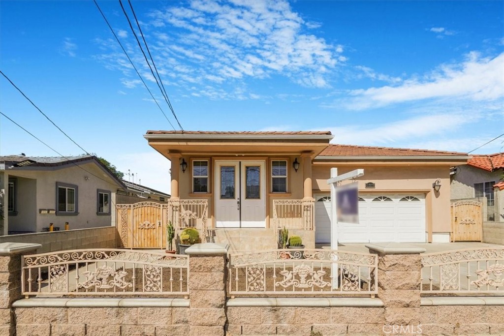 front view of a house with a street