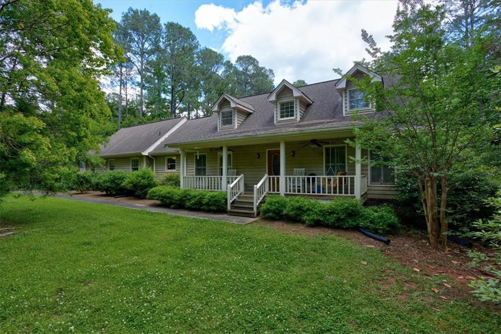 a view of a yard in front of a house