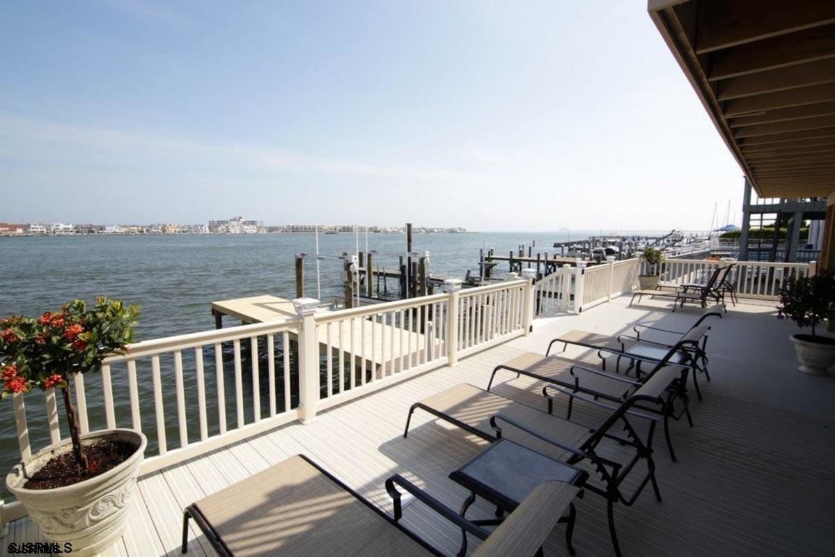 a view of a chairs and table on the terrace