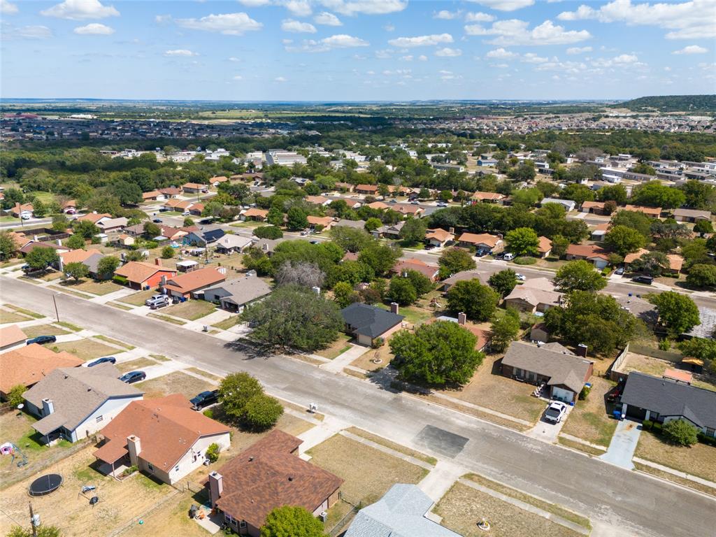 an aerial view of a city with lots of residential buildings