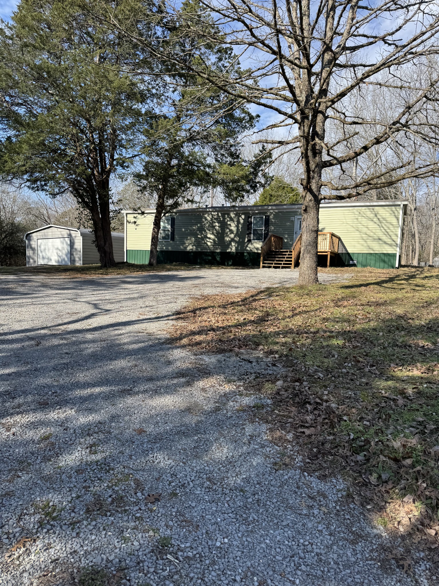 a house with trees in front of it