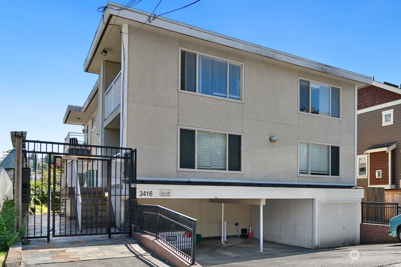 a front view of a house with stairs