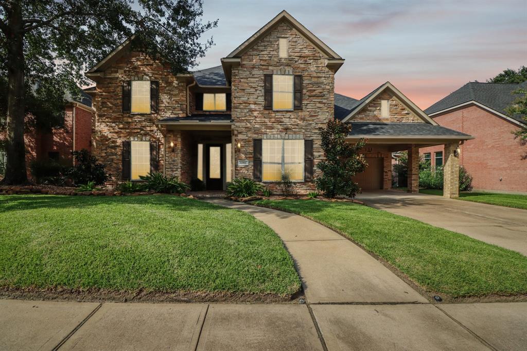 front view of house with a yard