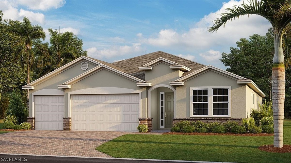 a front view of a house with a yard and garage