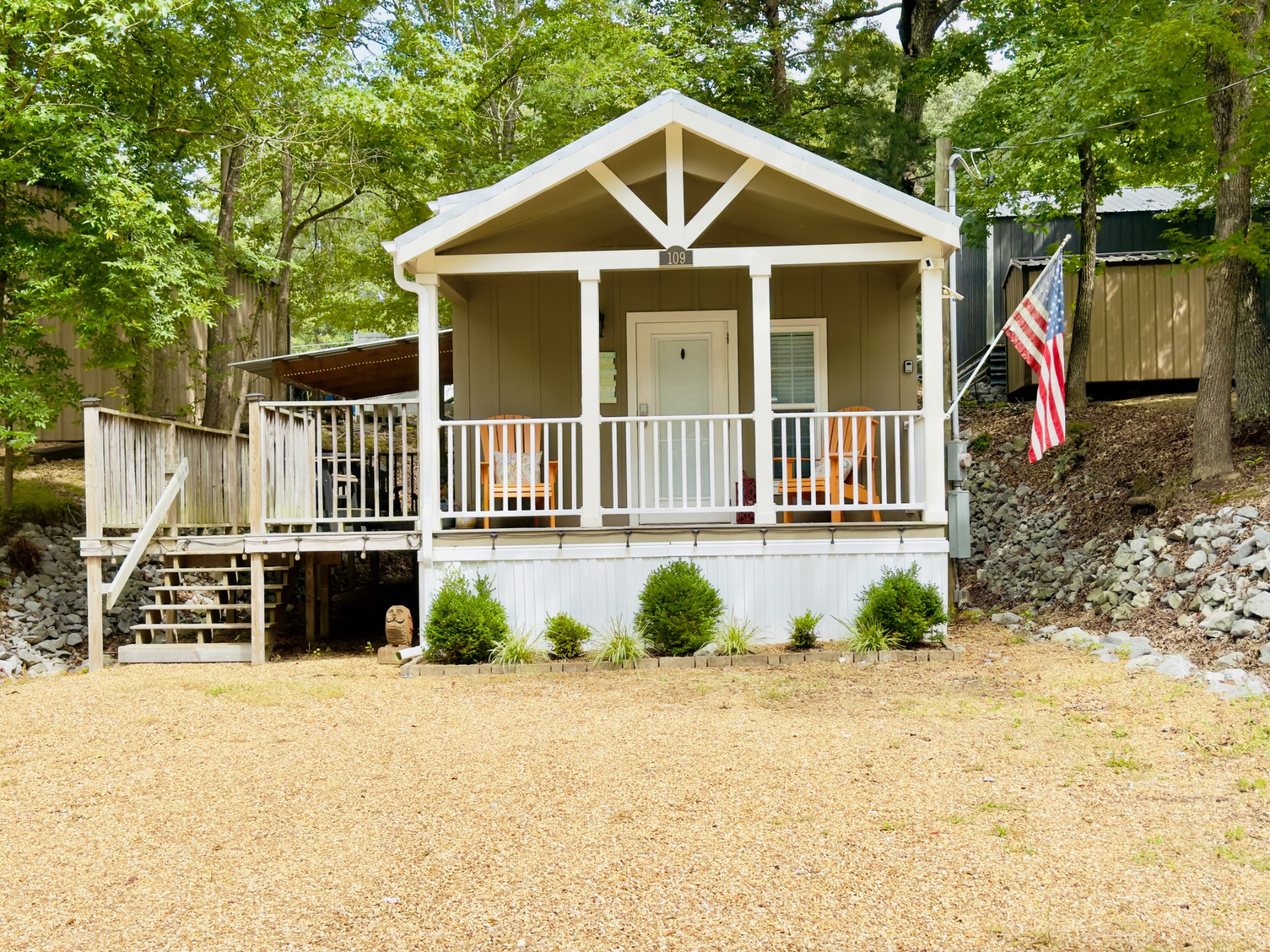 a front view of a house with garden