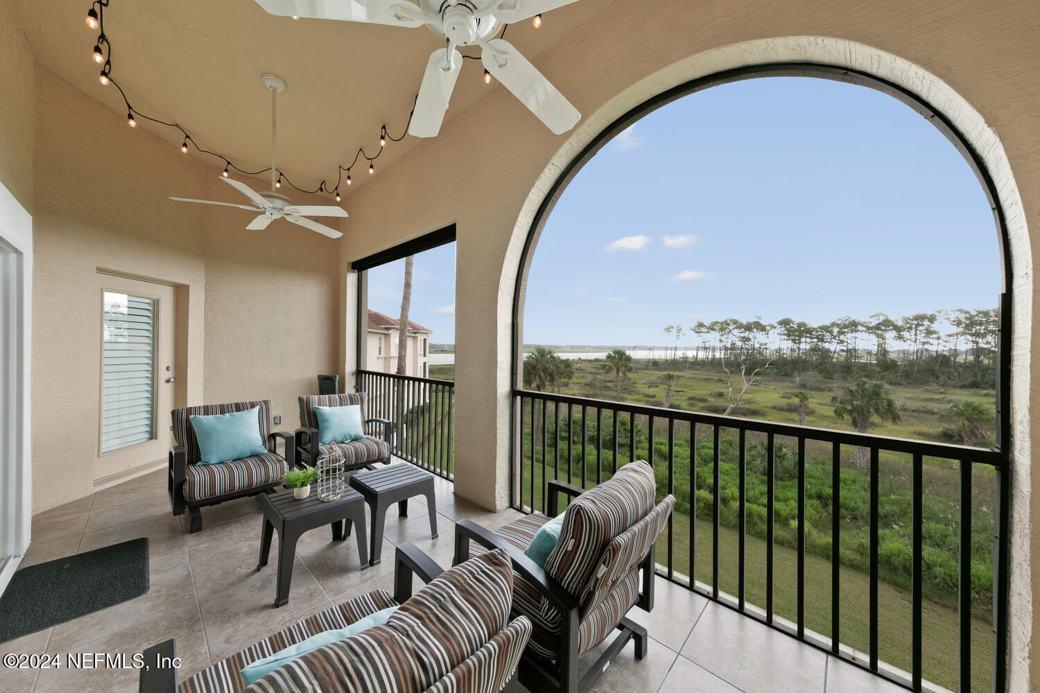 a view of a dining room with furniture window and outside view