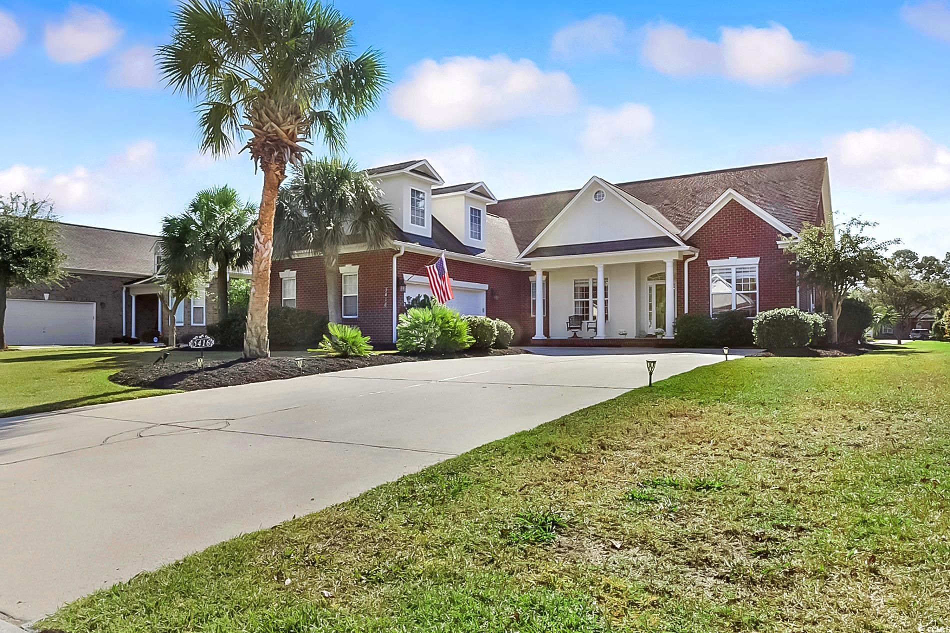 View of front of house featuring a front lawn