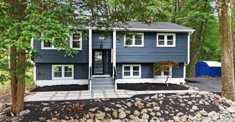 a front view of a house with a patio