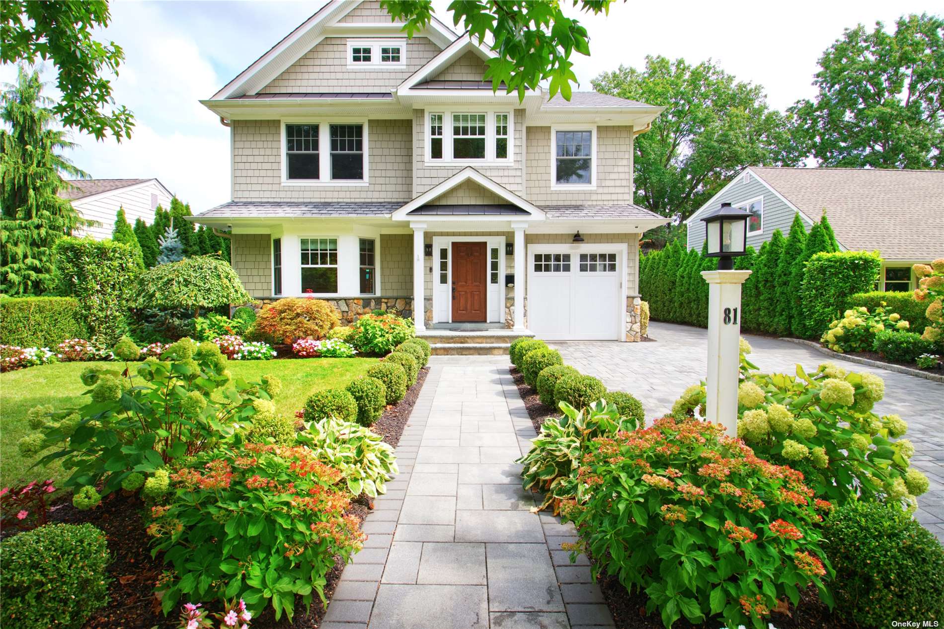 front view of a house with a yard