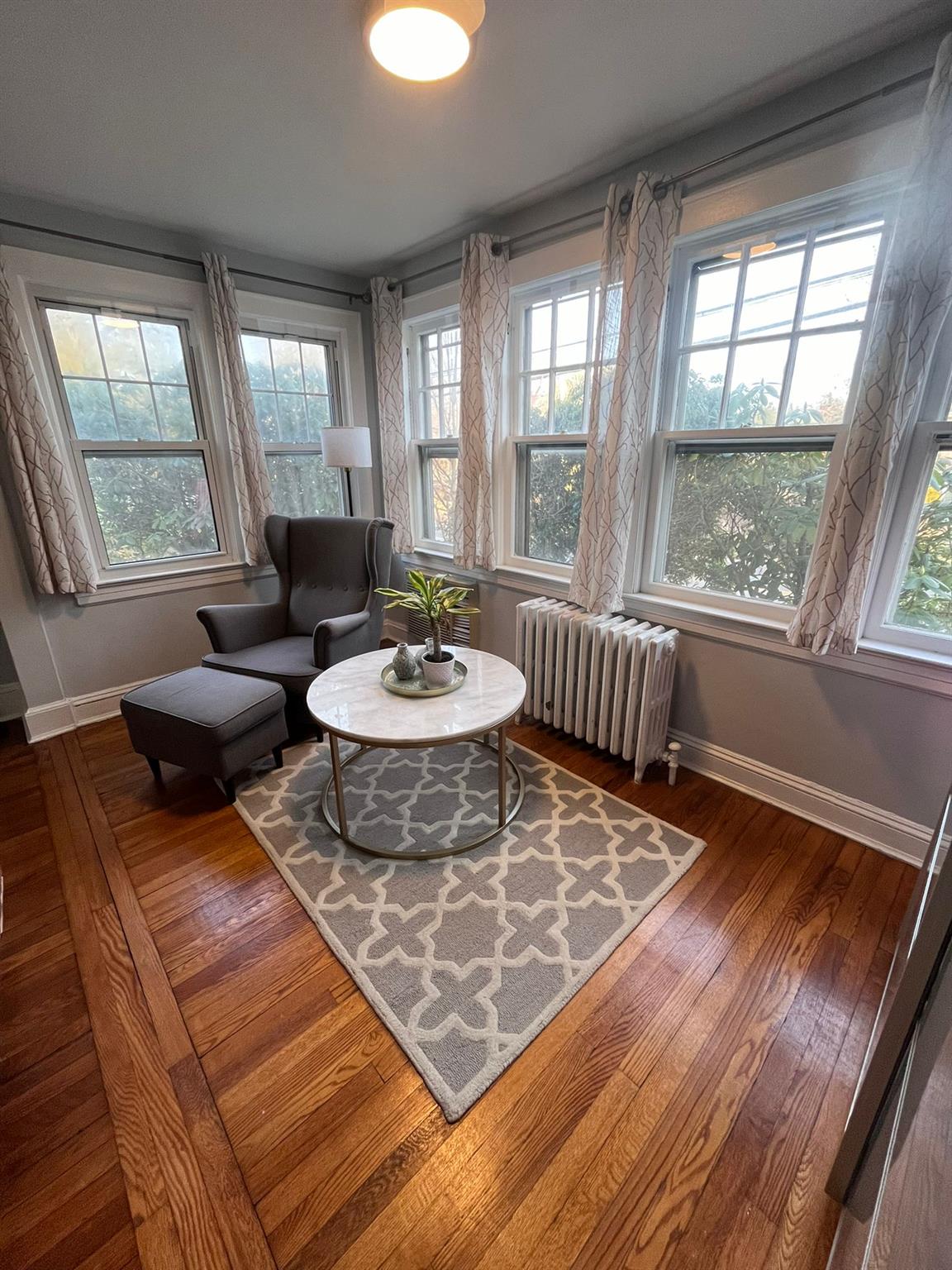 a living room with furniture and a table