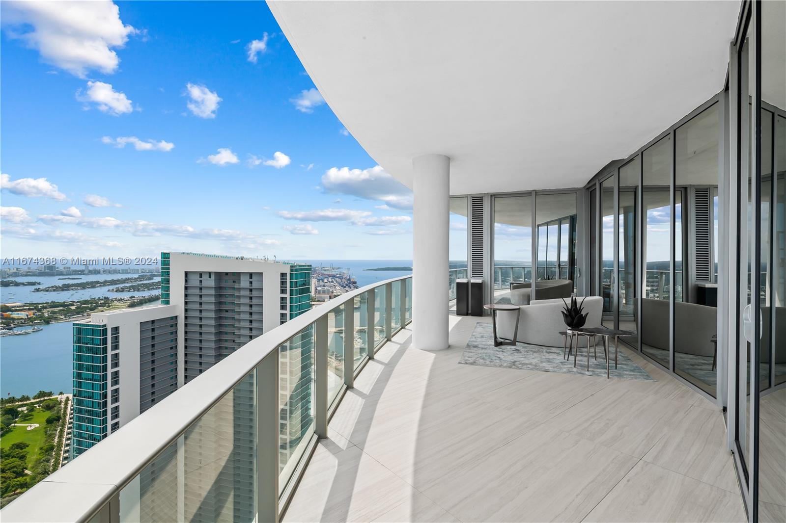 a balcony with chairs