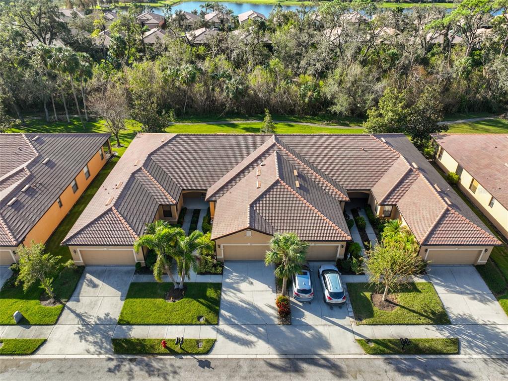 an aerial view of a house with a swimming pool