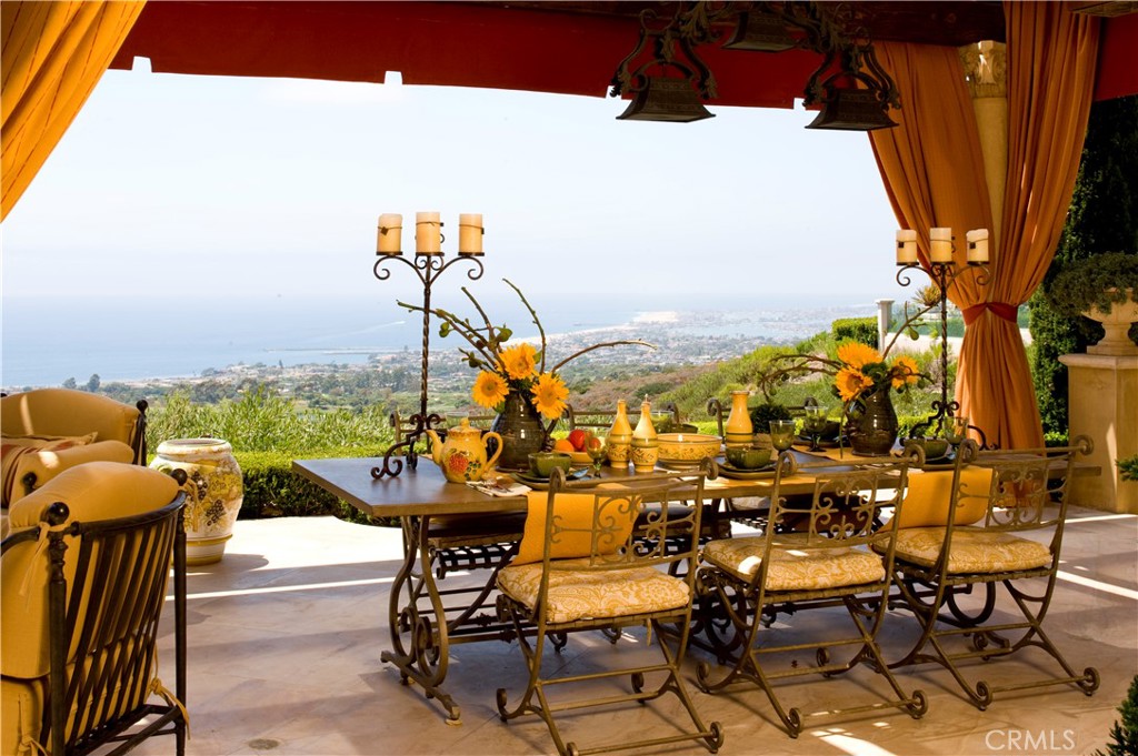 a view of a terrace with sitting area