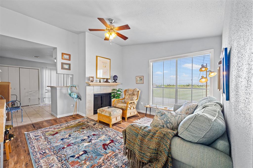 a bedroom with furniture and a fireplace