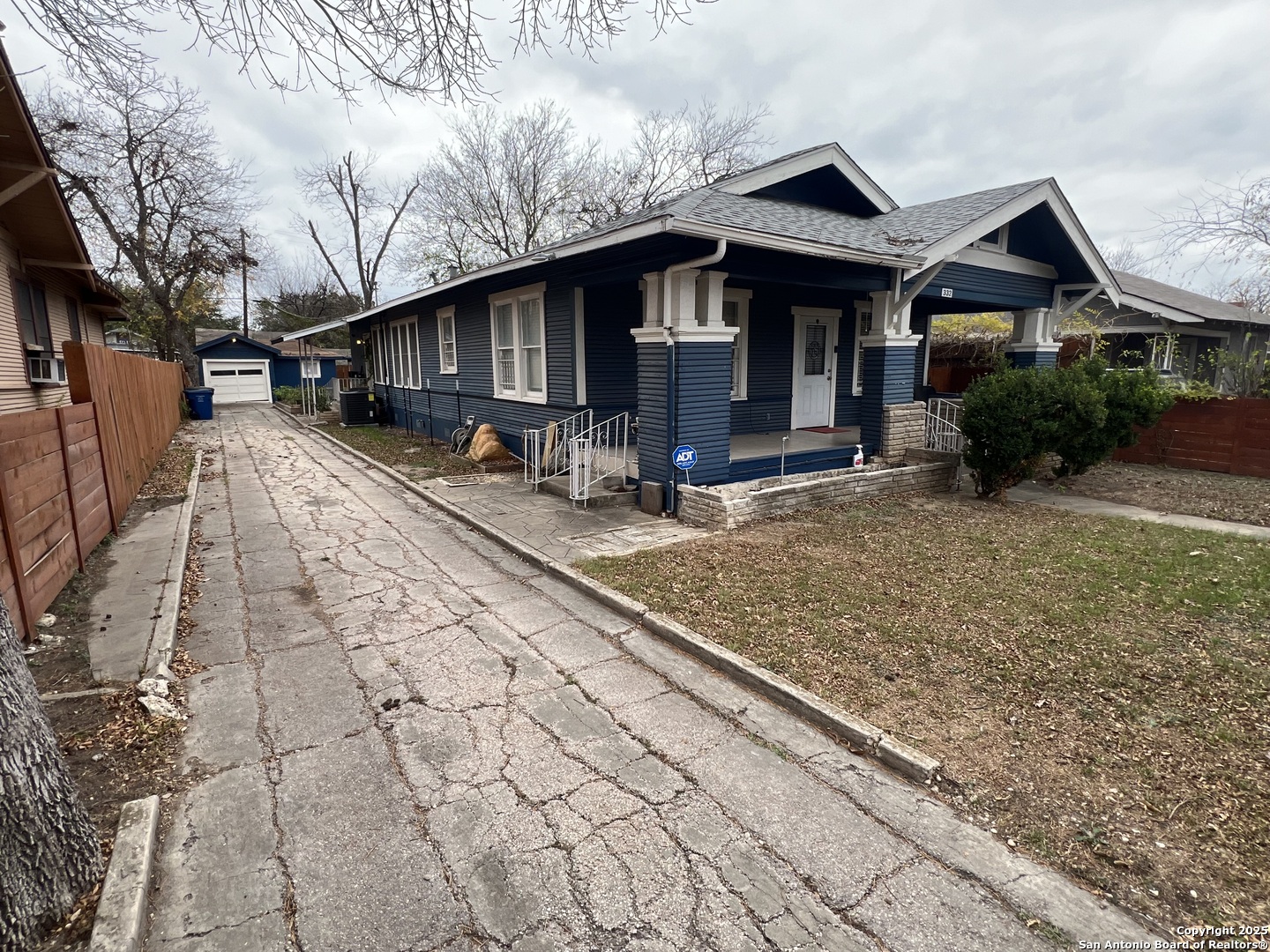 a front view of a house with yard