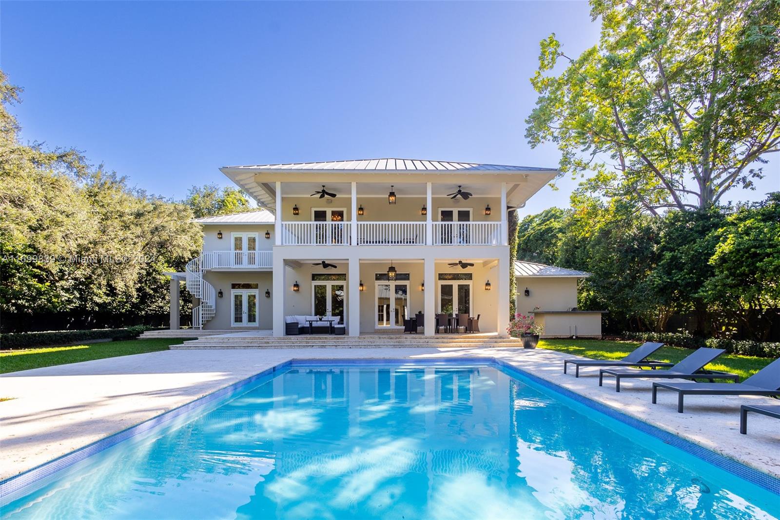 a front view of a house with swimming pool