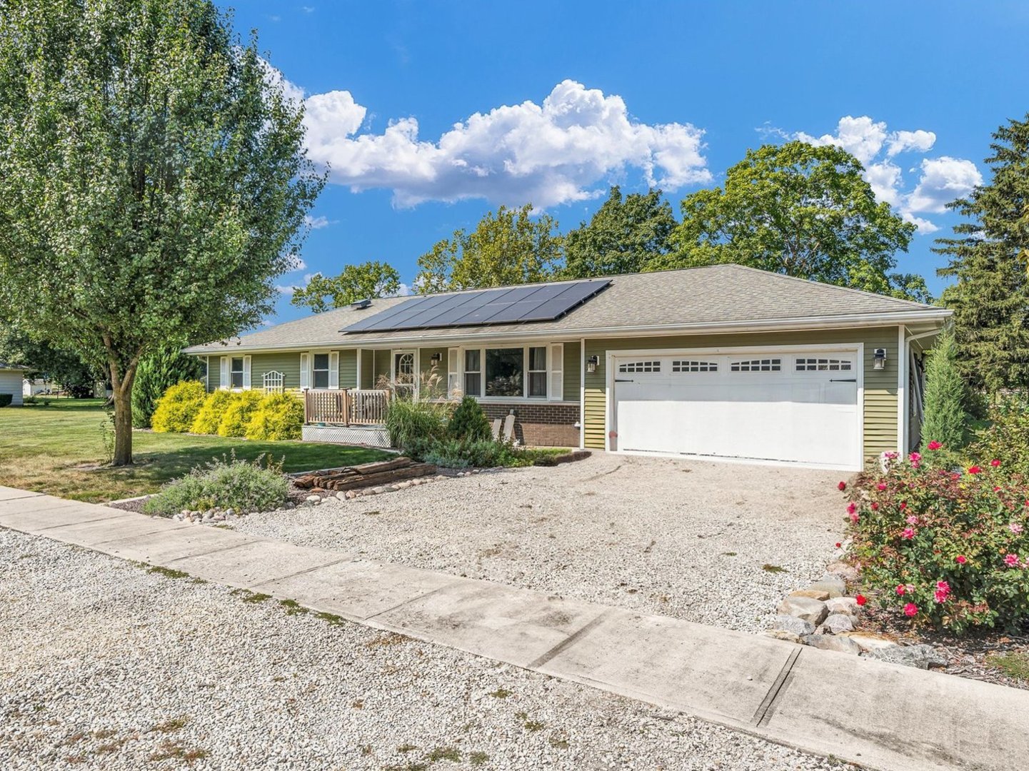 front view of a house with a yard