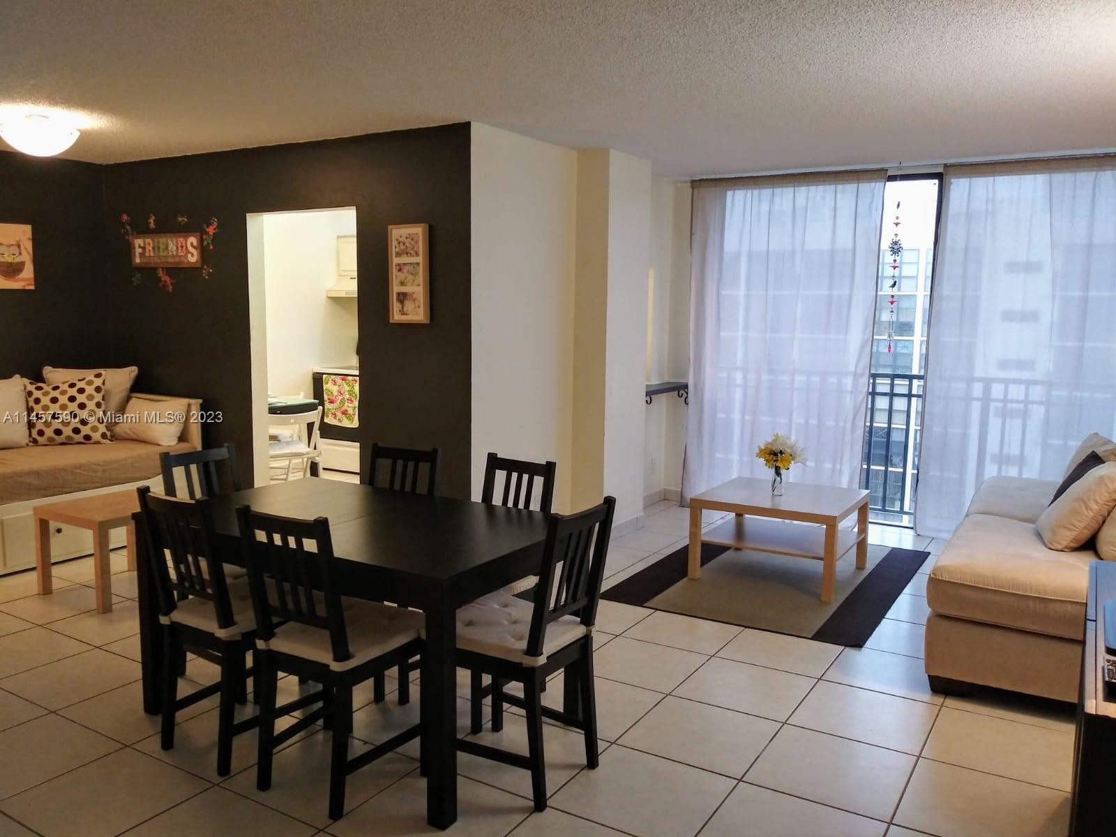 a view of a livingroom and dining room