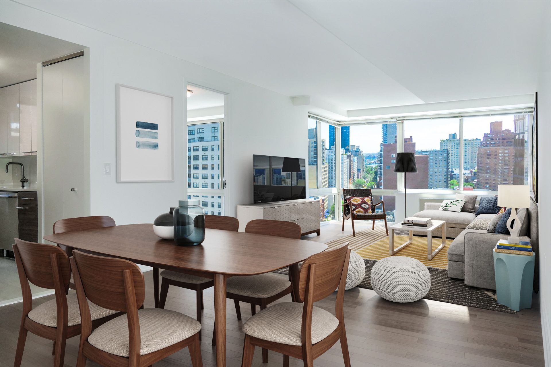 a view of a dining room with furniture and wooden floor