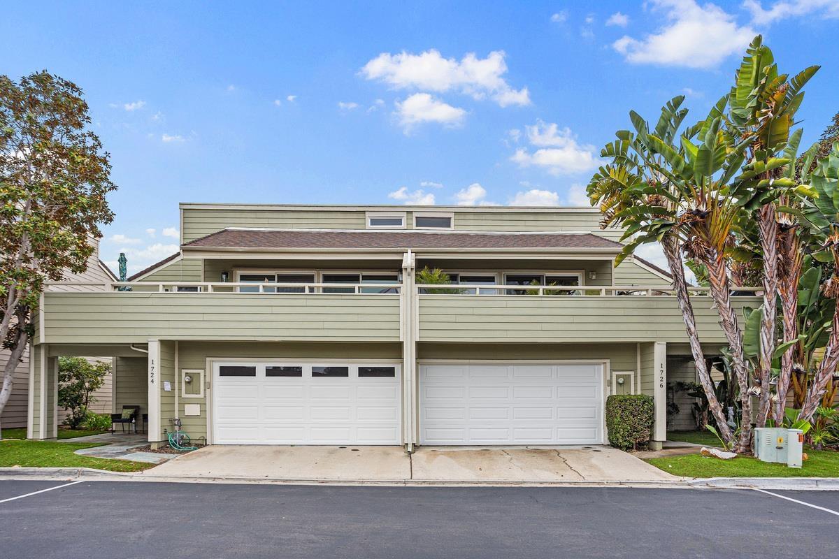 a view of a house with a garage