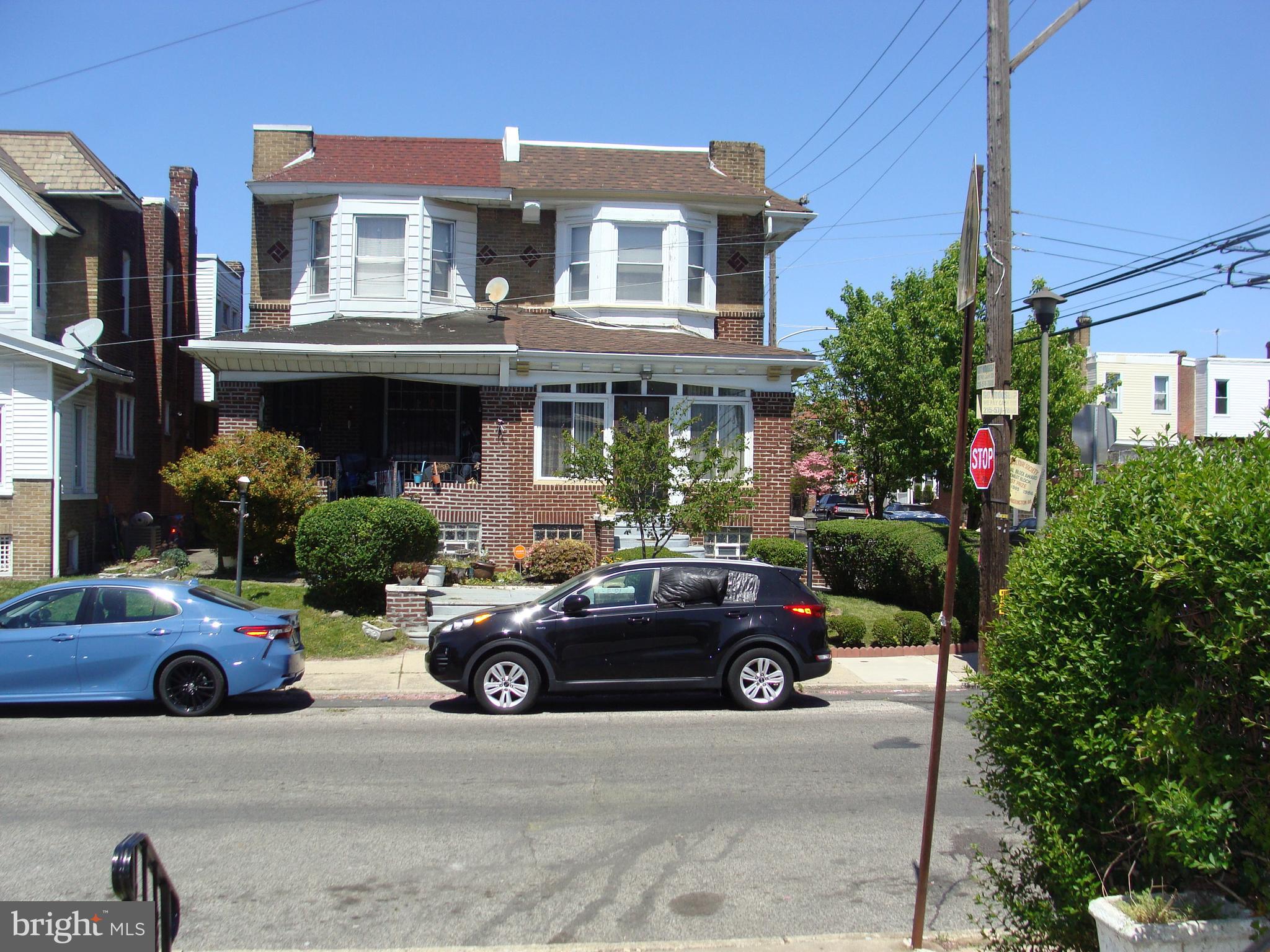 a car parked in front of a house