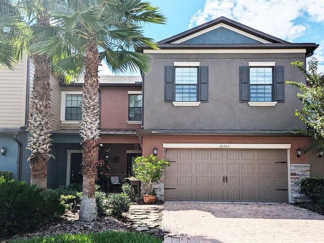 $475,000 | 28442 Tranquil Lake Circle | The Arbors at Wiregrass Ranch