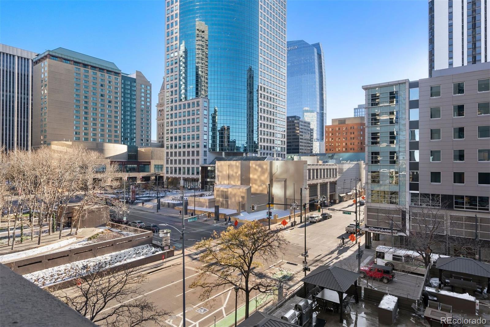 a view of city with tall buildings