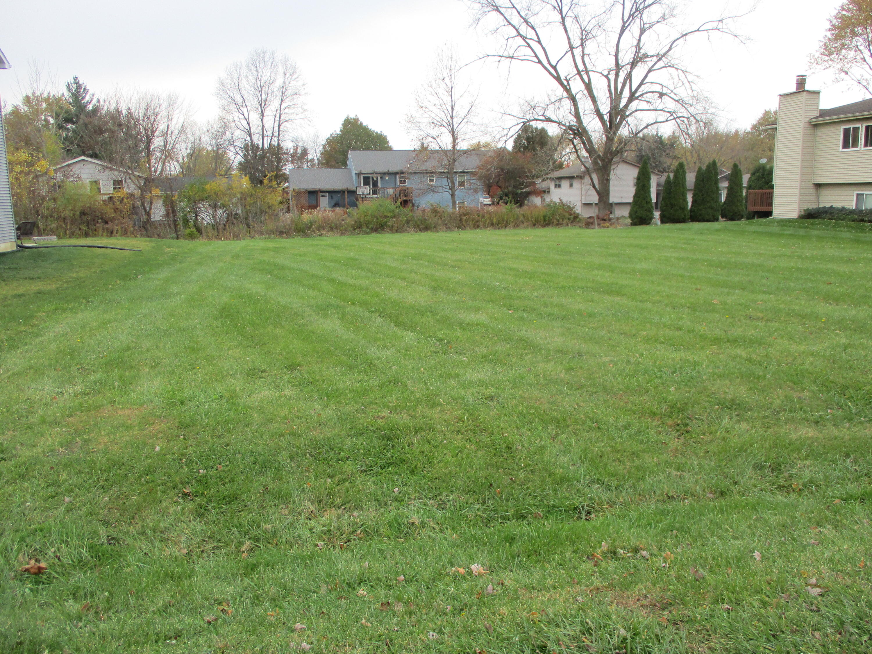 a fire hydrant in the middle of a field