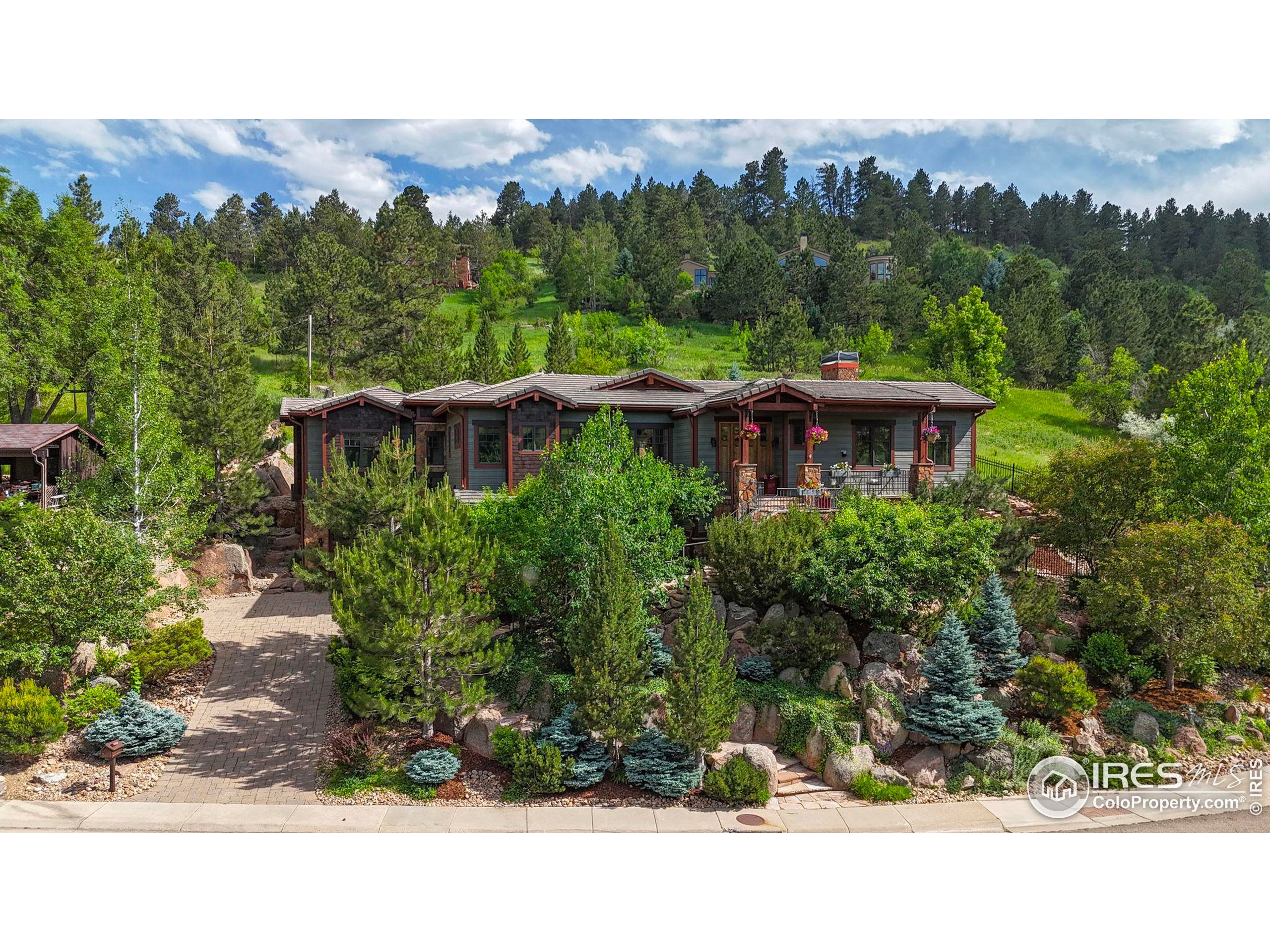 an aerial view of a house with a garden