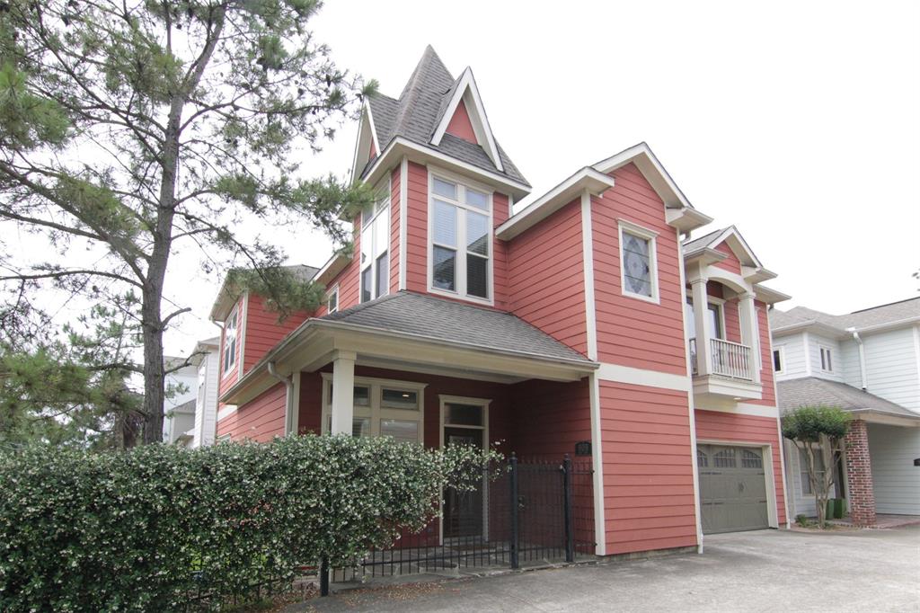 a front view of a house with yard