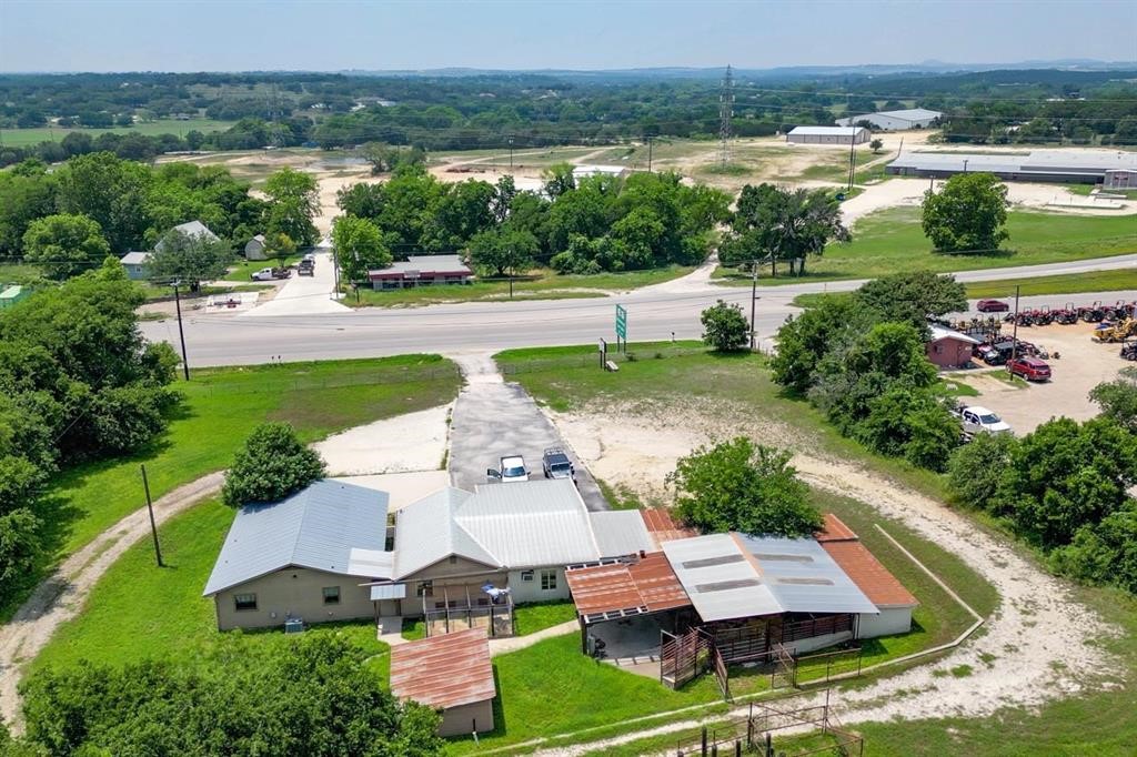 an aerial view of a house with outdoor space