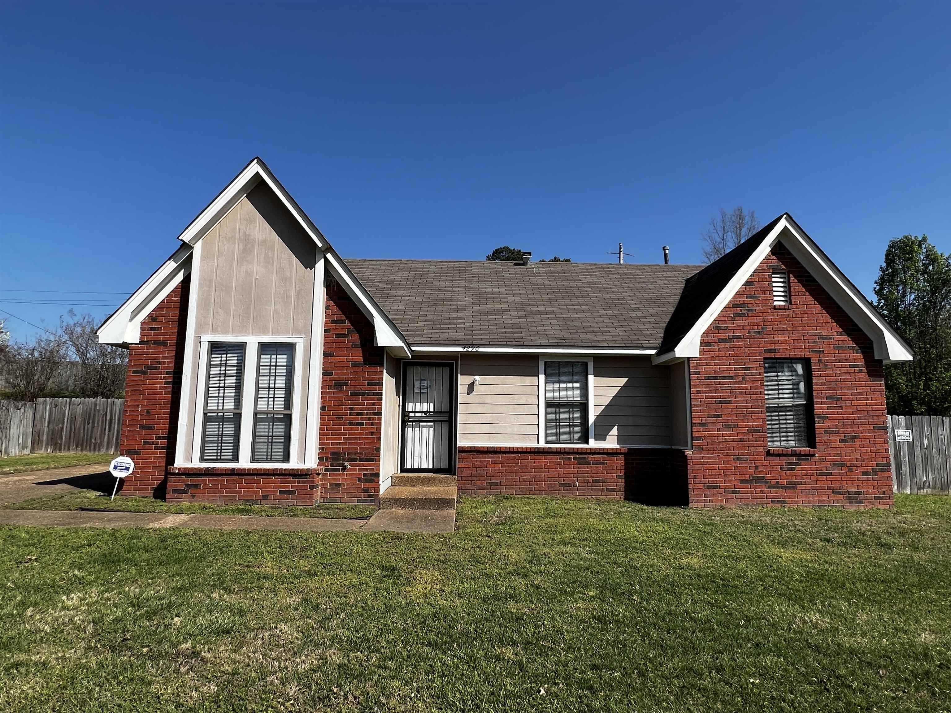 View of front of house with a front yard