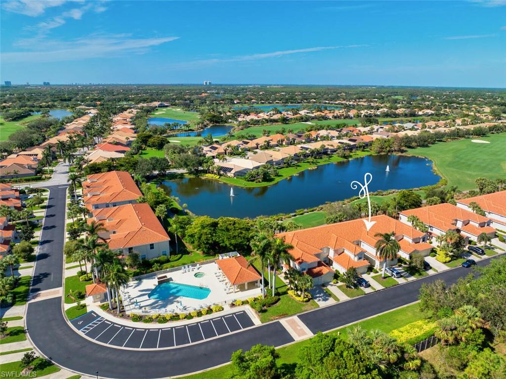 Aerial view featuring location and water view